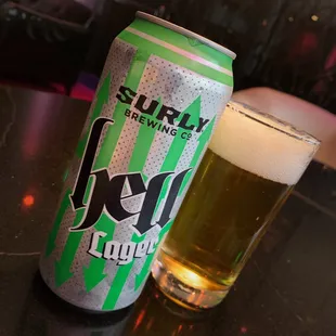 a can of beer and a glass of beer