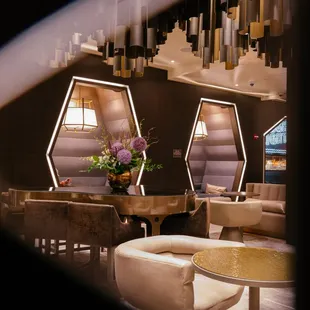 The Living Room Bar has cocktails as on point as the interior design.