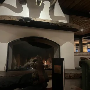 Drinks by the fireplace on a cool fall evening.