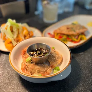 During happy hour we tried the dumplings, empanada and the buffalo cauliflower.