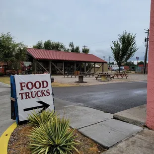 Tables to eat next to the loaded bowl restaurant