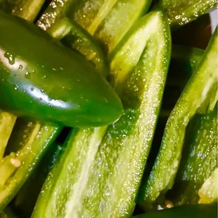 a pile of oklery peppers