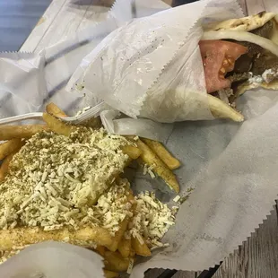 Classic combo with Greek fries .