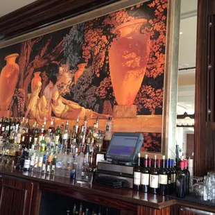 a woman sitting at a bar