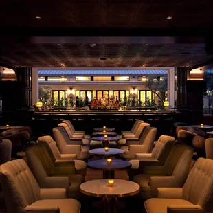 chairs and tables in a dimly lit room