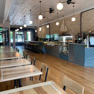 Main seating area, nice mix of tables/booths and barstools.