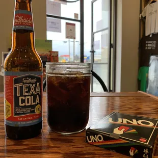 a cold beverage and a book