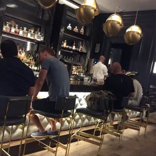 Minimalist bar, in dark secluded section of hotel