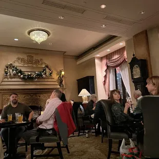 a group of people sitting at a table