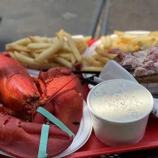 Lobster and Fresh Lobster Roll Sandwich with Homemade chowder in the traditional new England style