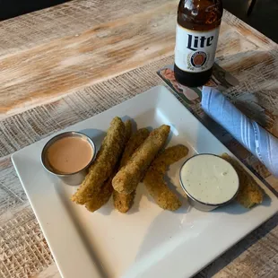 FRIED PICKLES - These are large dill slices. They are not cut up into fried pickle chips like most places.