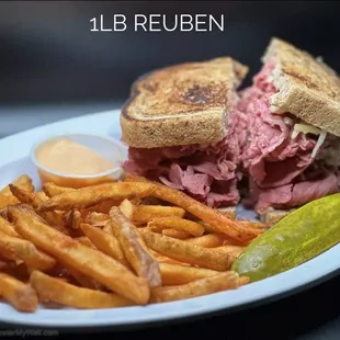 a sandwich and fries on a plate