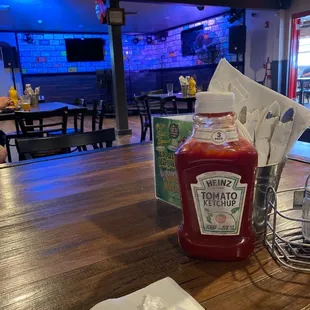 Lots of license plates on wall behind where the bands perform.