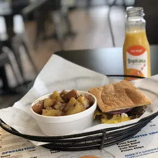 Come try our breakfast! Pictured here is "The Greek" on pressed Cuban bread.