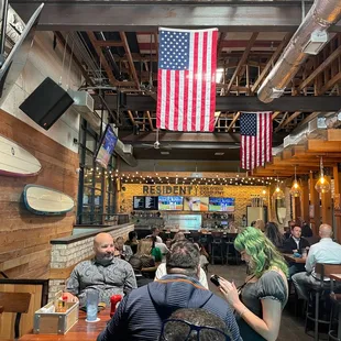Shot of main dining area looking back to a bar area.