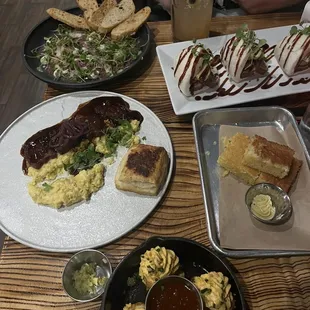 Beef carpaccio, pork buns, crispy pork belly w/grits, devilled eggs, and some bread on the house.