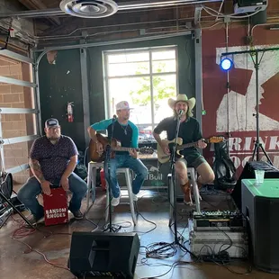 a group of men playing instruments