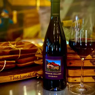 a bottle of wine and two glasses of wine