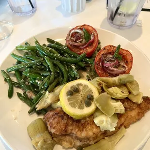 Sautéed Chicken Breast &amp; Artichokes with capers &amp; lemon in wine sauce, risotto cakes topped with balsamic tomatoes and garlicky green beans