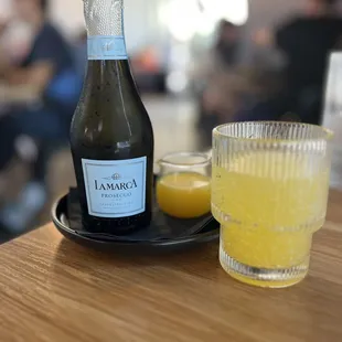 Mimosa- they changed the glasses to this juice/water glass. I miss the beautiful, elegant vessel.
