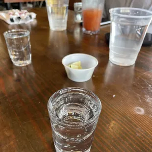 a shot of water in a glass