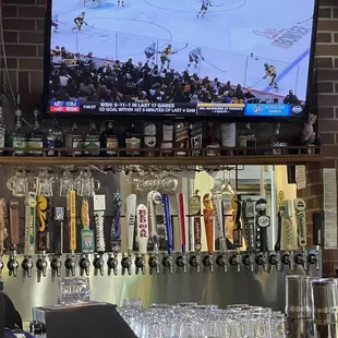 a hockey game being played on tv