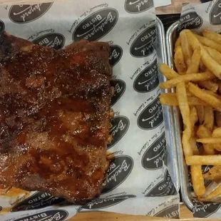 Full rack of ribs with double fries $25.00