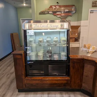a counter with a display case