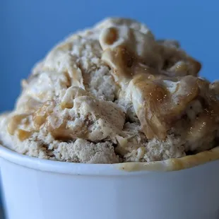 Banana Foster Ice Cream made with banana ice cream and bananas sauteed with rum, brown sugar and caramel, ribboned throughout