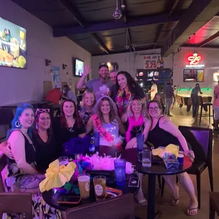 a group of women sitting at a table