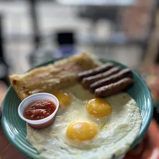 a person holding a plate of food