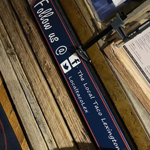a street sign on a bench