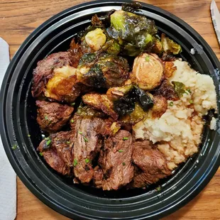 Steak Tips, mashed potatoes &amp; many Brussels sprouts.