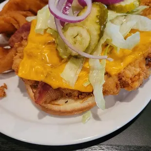 Breaded tenderloin with bacon and cheese