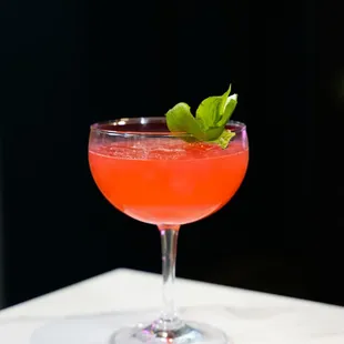 Try our Kiss &amp; Tell! Made with Tanquerey, St. Germain, Lime, Raspberry, &amp; Mint