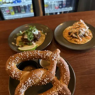 Pretzel, carnitas taco and kalua taco!