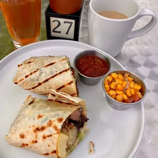 a plate of food and a cup of coffee