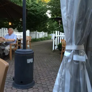 This is a view from our table back towards the parking lot. Nice outside dinning.