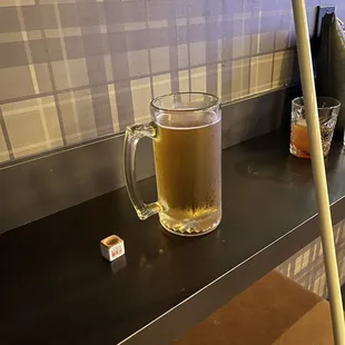 a mug of beer on a table