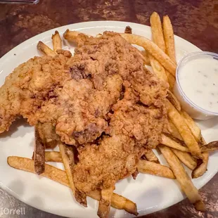 Fresh cut and battered steak fingers with fresh cut fries.