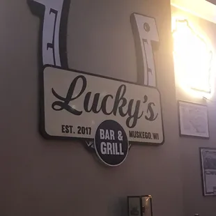 Luckys @ The Lodge used to be located you the street at the old brick house. This is a sign from the old location.