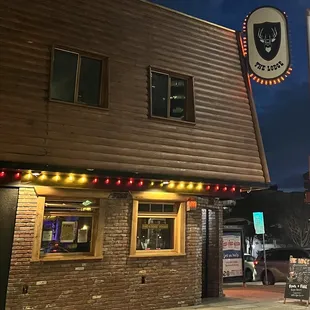 the front of the lodge at night