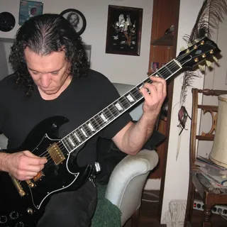 John E.