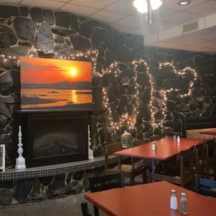 a fire place in the middle of the room