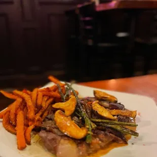 Thai seasoned Steak  with asparagus, mushrooms and sweet potato fry&apos;s!