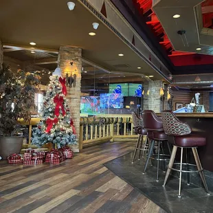 a bar with a christmas tree