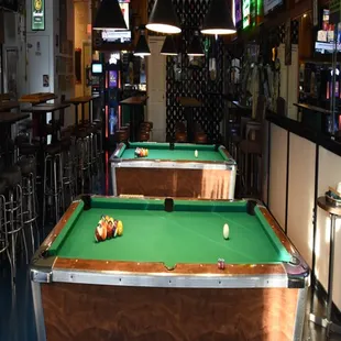a pool table in a bar
