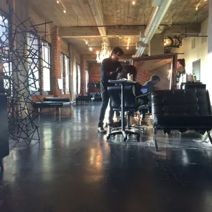 Alex doing what he does best. He's does an amazing job on my pixie cut. [Pictured doing some color!]