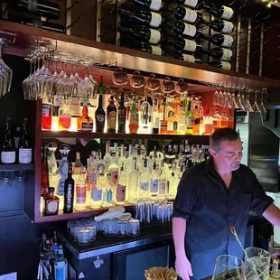 a bartender at the bar