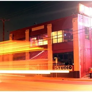 a blurry photo of a building at night